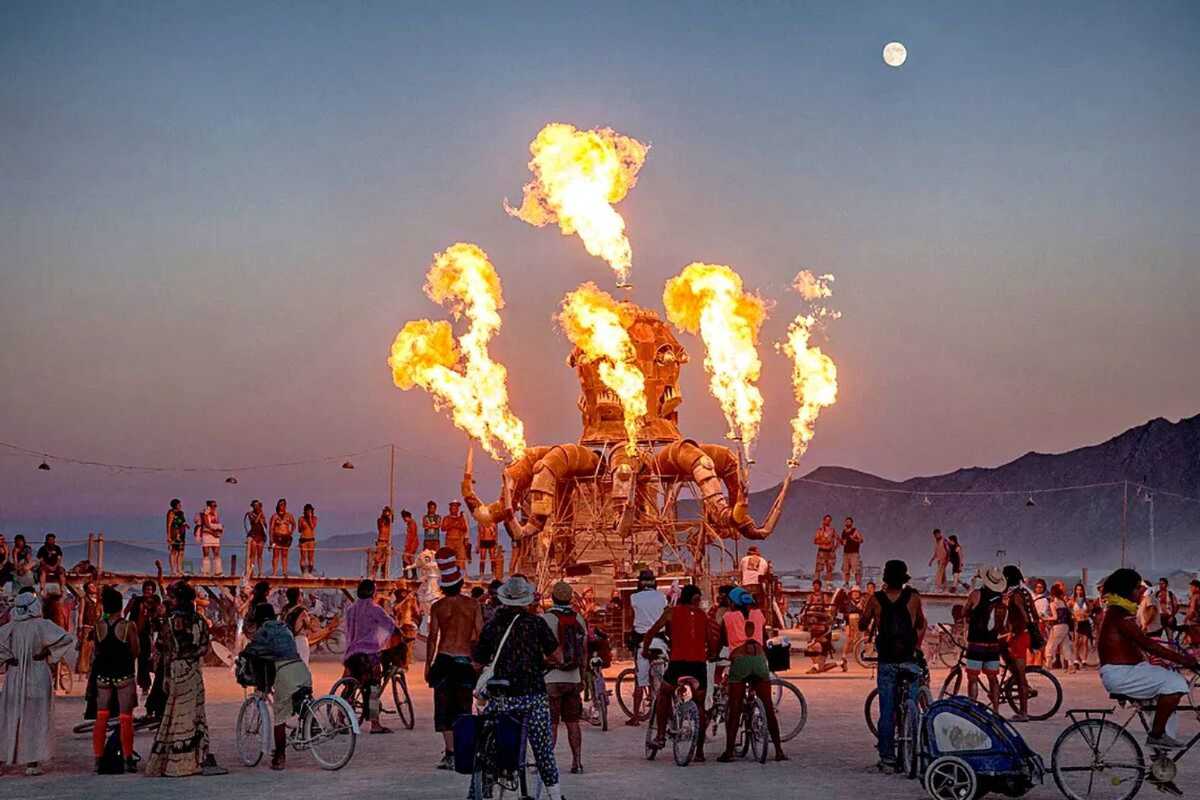 Burning Man 2025 massive art installation glowing at night in Black Rock Desert